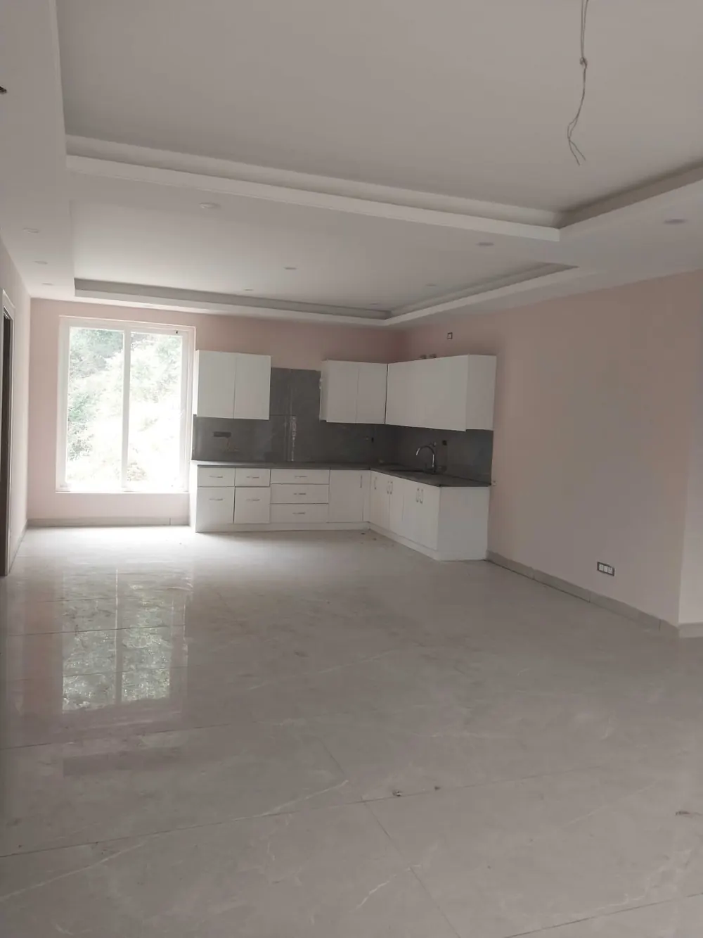 Kitchen and dining space with window